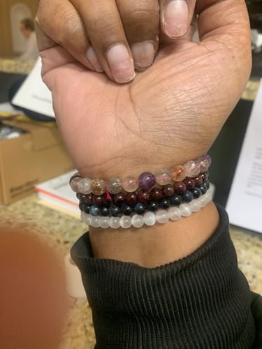 Customer photo review of Amethyst & Rutilated Quartz Bracelet  - 8mm beads