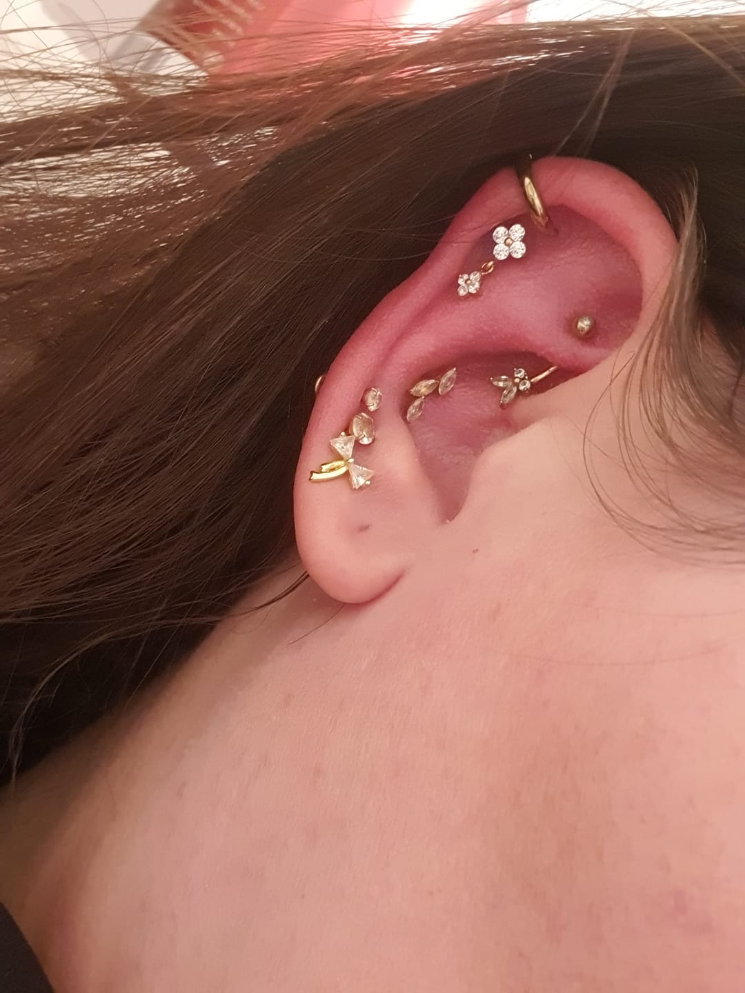 Customer photo review of Double Four Piercing | Titan