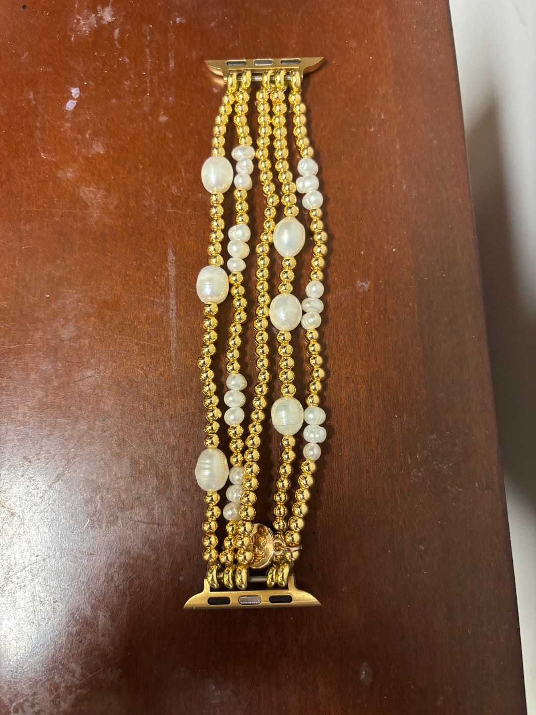 Customer photo review of Gold and Pearl Stretch Apple Watch Strap