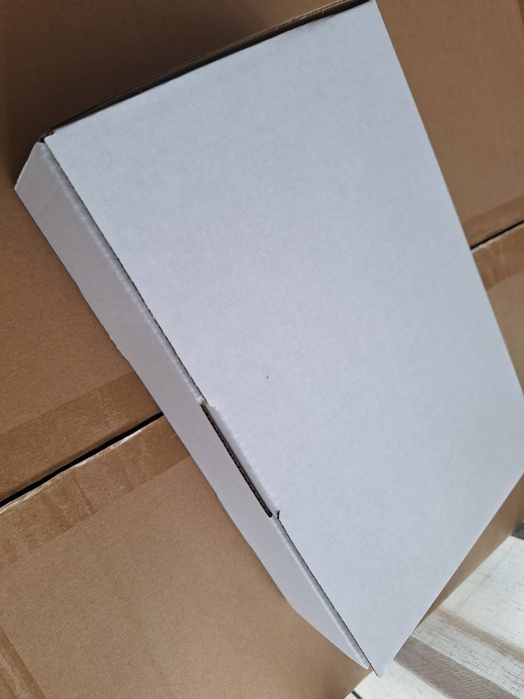 Customer photo review of 240 x 150 x 60mm Die cut White Mailing Box B14