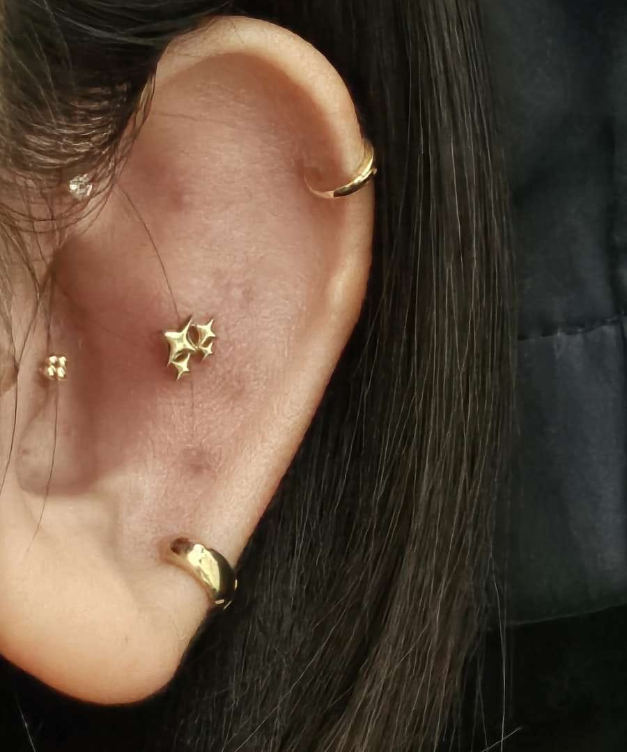 Customer photo review of 14K Gold Mini Helix Hoop Earring