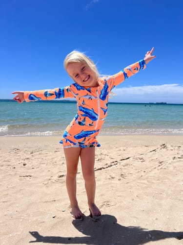 Customer photo review of Fluro Orange Sharks Girls Long Sleeve Zip Swimmers