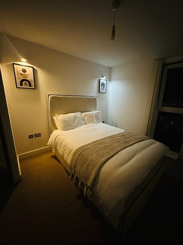 Customer photo review of Adriana Tall Headboard Piped Bed Frame