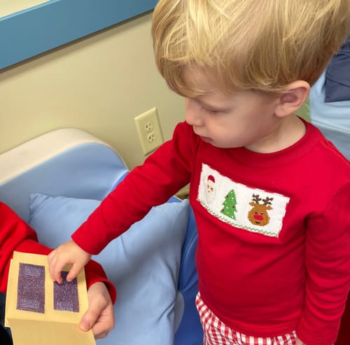 Customer photo review of Santa's Magic Smocked Red Gingham Pant Set