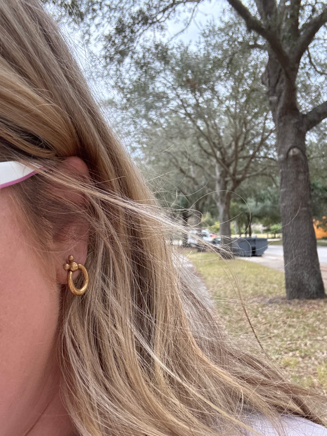 Customer photo review of Mini Leader of the Club Earrings