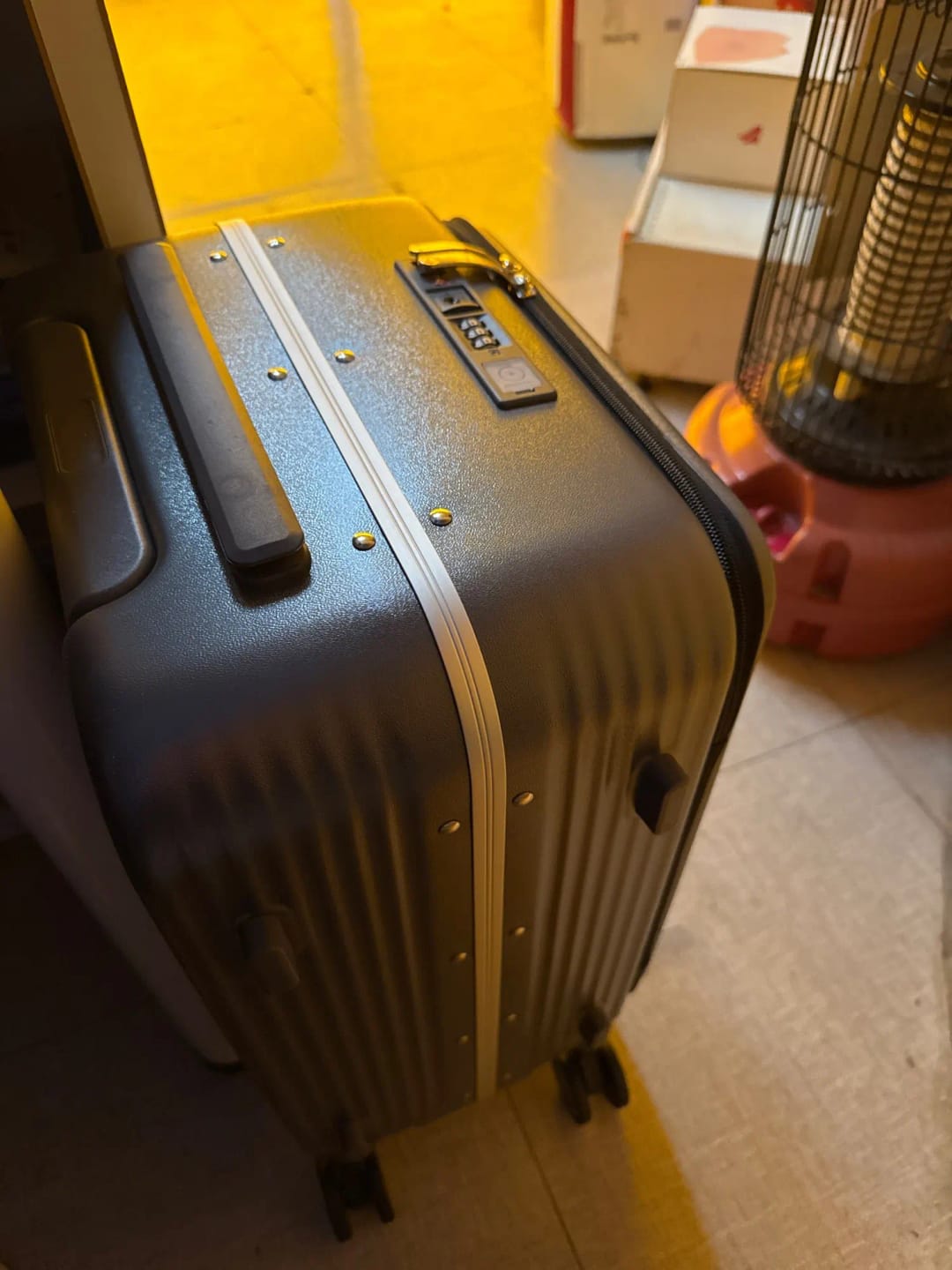 Customer photo review of Aluminum Frame Carry-On Luggage With USB Port And Phone Holder — White | KIMLUD