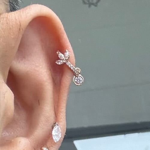 Customer photo review of Scalloped Diamond Charm by Maria Tash in Rose Gold.