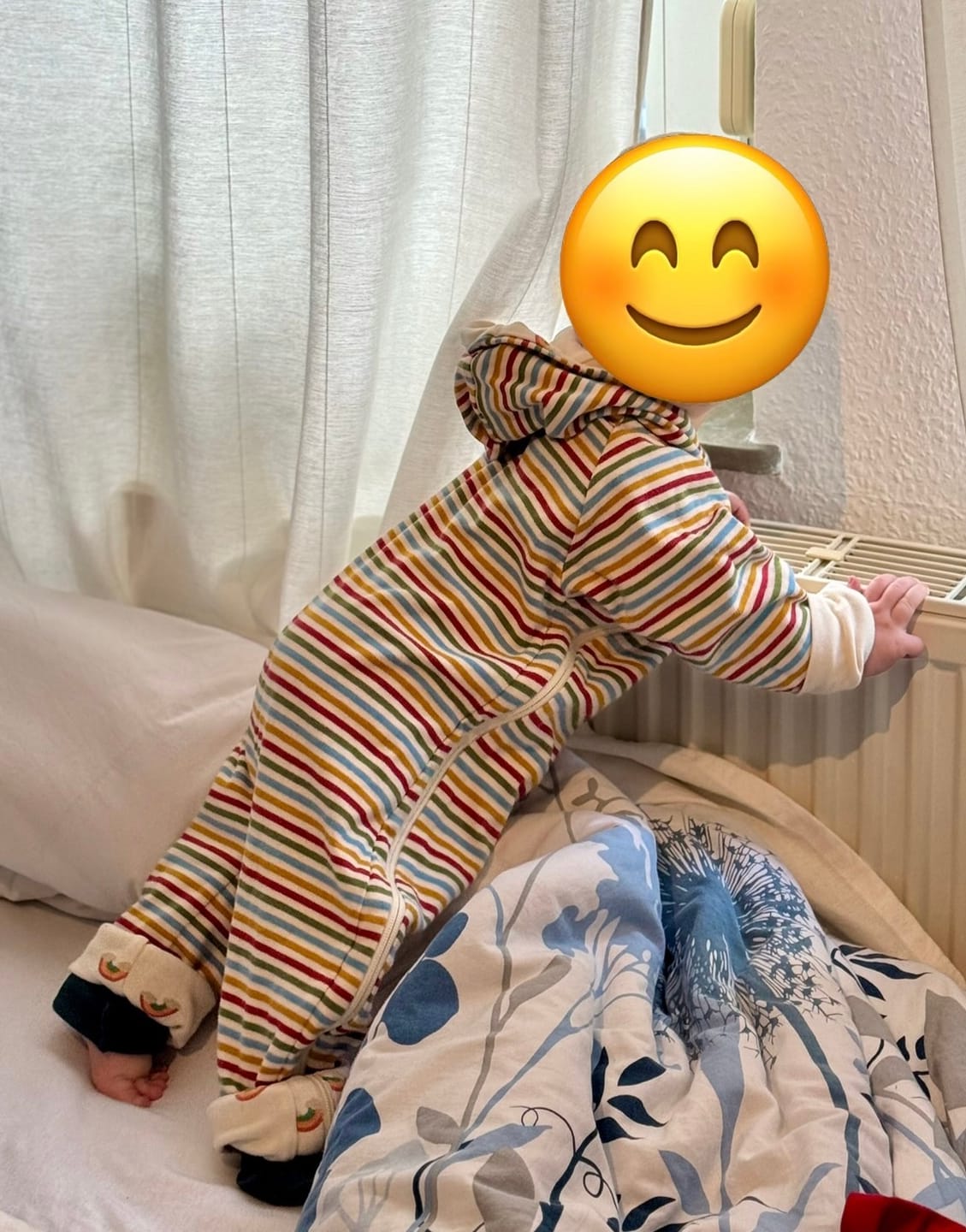 Customer photo review of Cream Rainbows Reversible Hooded Snug As A Bug Suit