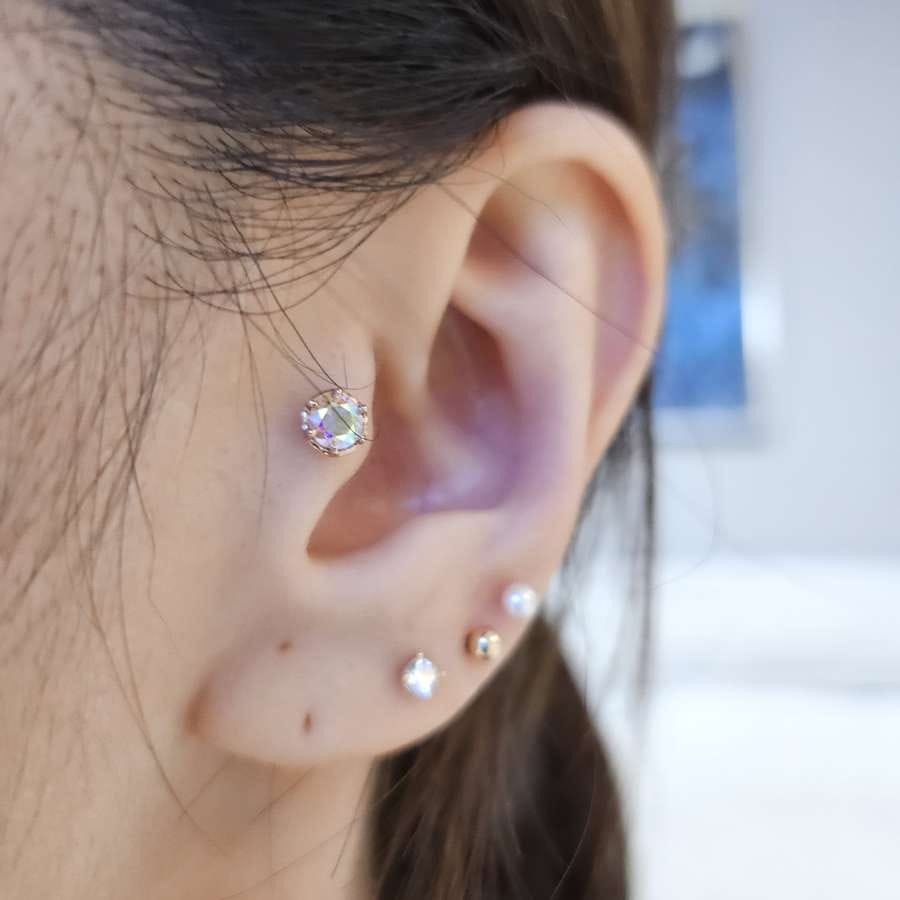 Customer photo review of 14K Gold Moissanite Aurora Internally Threaded Labret Piercing 18G16G