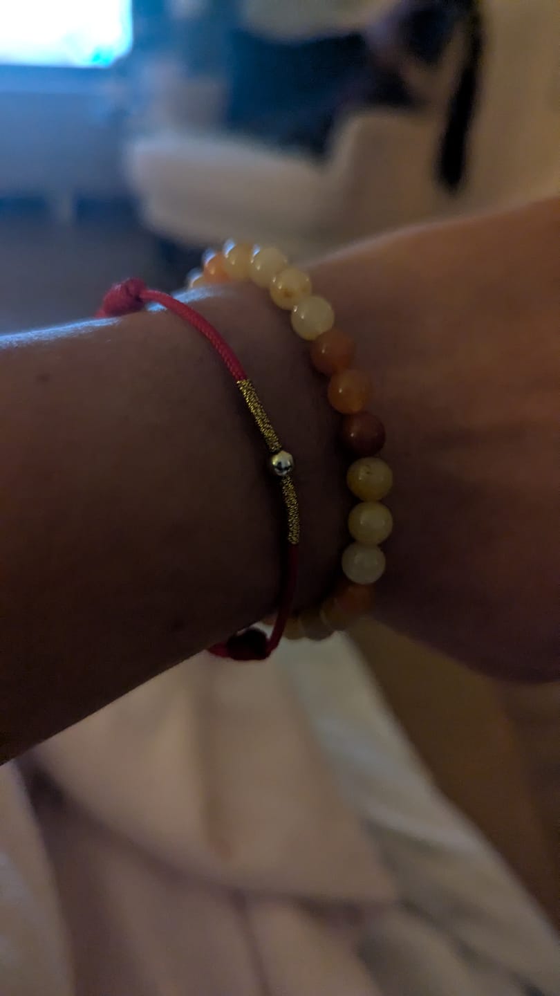 Customer photo review of Buddha Stones 925 Sterling Silver Golden Bead Protection Braided Rope Bracelet Anklet