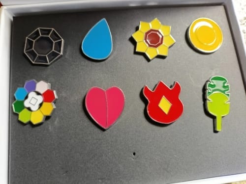 undefined review of Pokémon League Gym Badges Set - Sinnoh, Johto, Indigo, Hoenn Regions | Metal Brooches & Figures Featuring Pikachu, Squirtle & More image 1 out of 1
