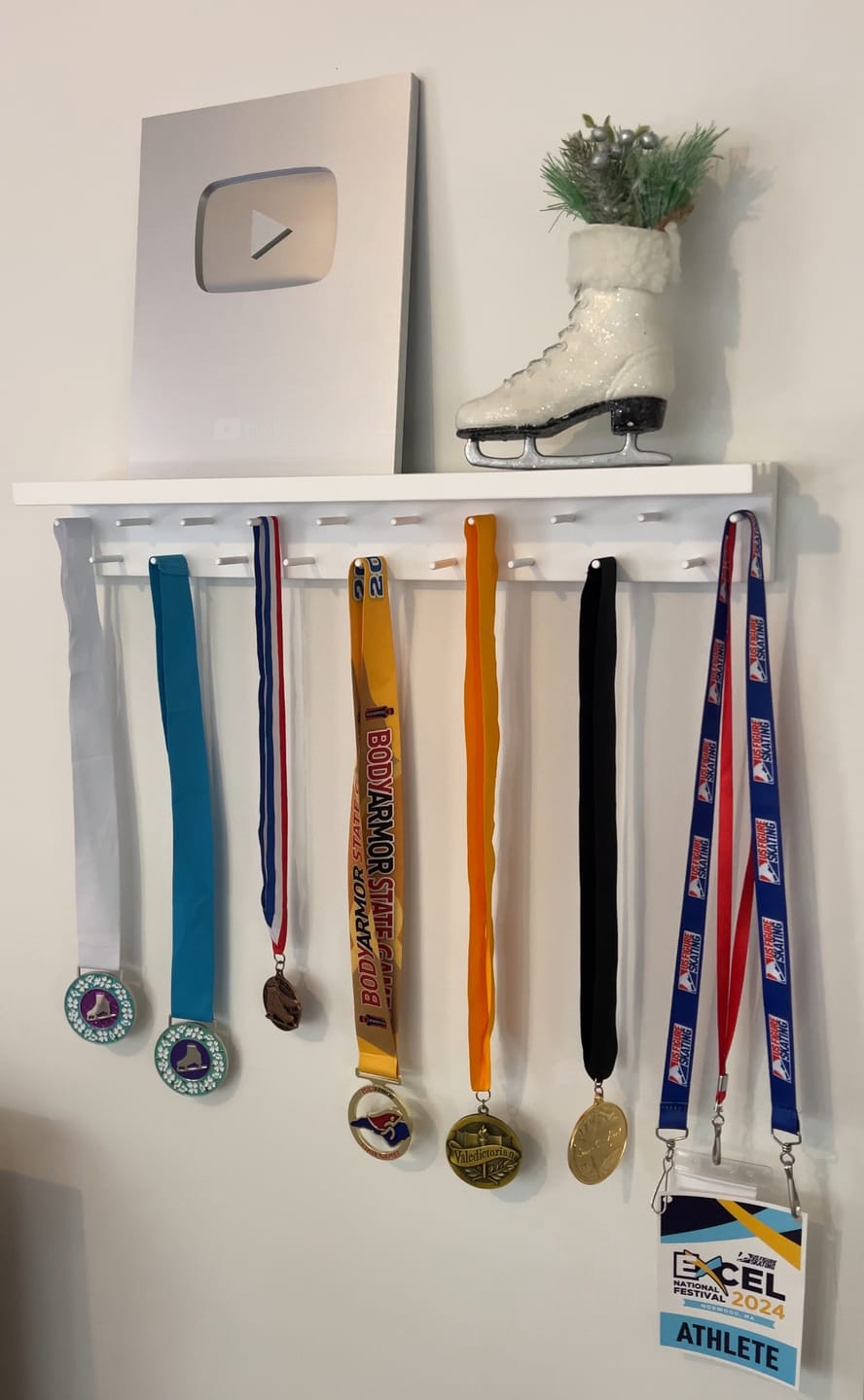Customer photo review of 2ft Medal Awards Rack Premier Trophy Shelf- Trophy, Plaque and Medal Display