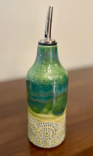 Customer photo review of Chrome Pour Spouts w/ Plastic Vent (liquor & olive oil use)