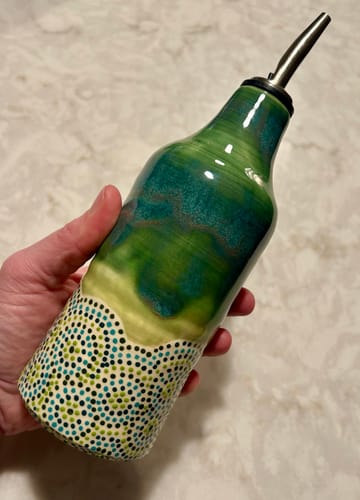 Customer photo review of Chrome Pour Spouts w/ Plastic Vent (liquor & olive oil use)