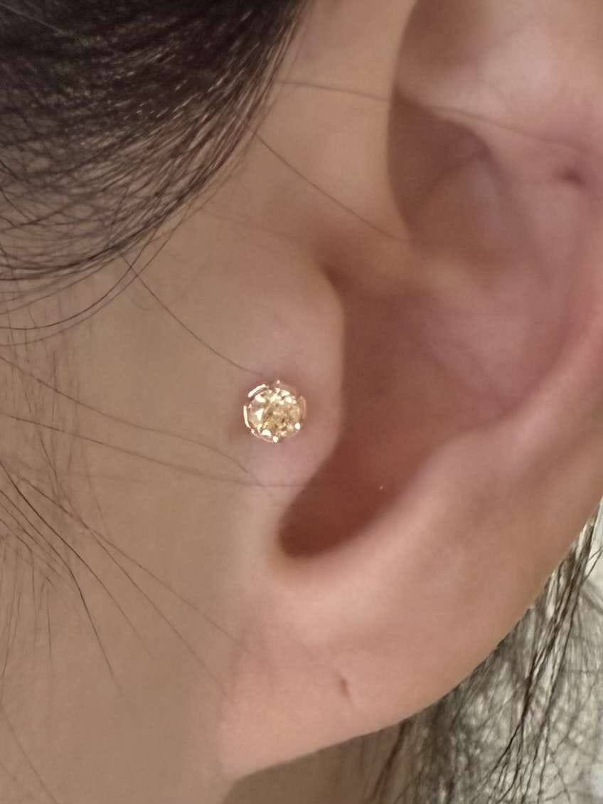 Customer photo review of 14K Gold Moissanite Imperial Dia Cartilage Earring 20G18G16G