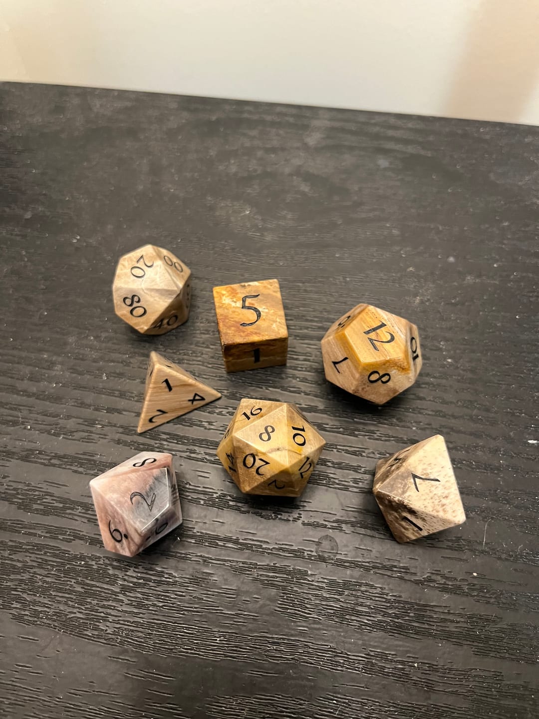 Customer photo review of URWizards D&D Petrified Wood Gemstone Engraved Dice Set(Limited edition)