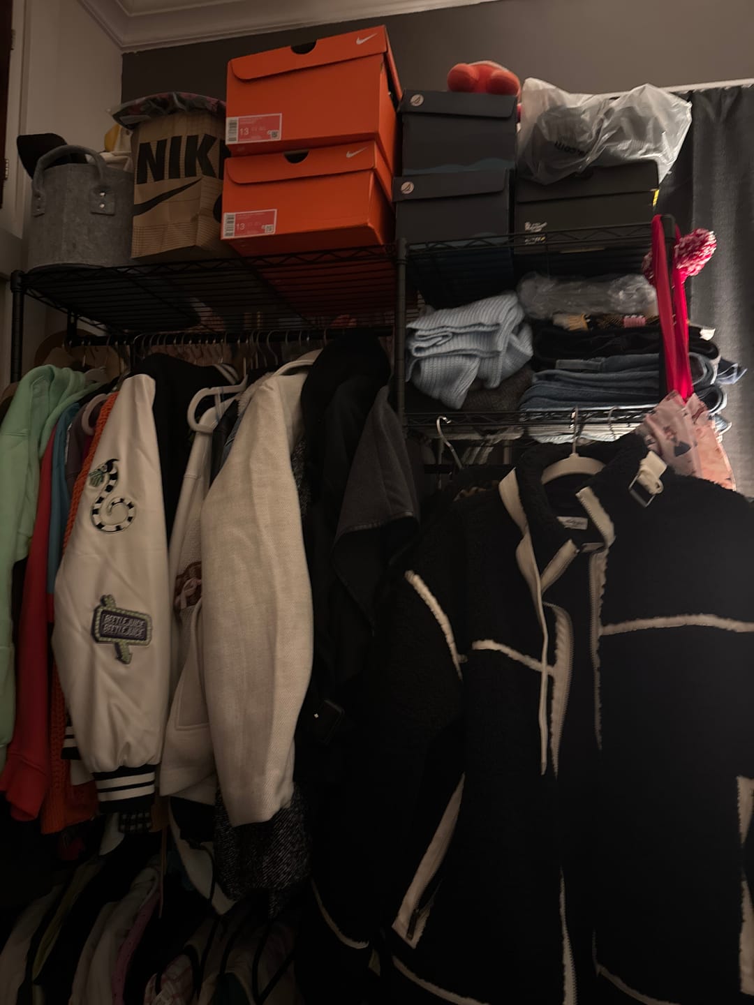 Customer photo review of Raybee Heavy Duty Portable Clothes Rack With Wheels,Clothing Rack For Hanging,Garment Rack For Bedroom