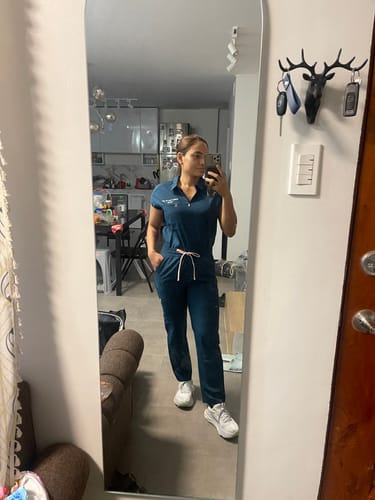 Customer photo review of Zip-Up Polo MoveTech® Scrub Top - Women / Pacific Tide