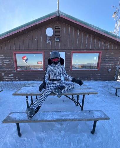 Customer photo review of Women's Slim-Fit Stretch Faux Fur Houndstooth One-Piece Ski Suit