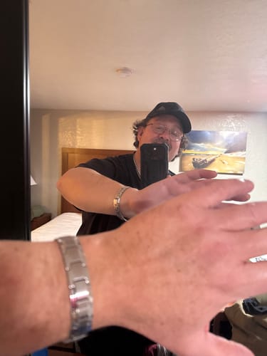 Customer photo review of Iron Man Armor Titanium Magnetic Bracelet: Helps Pair Veterans With A Service Dog Or Shelter Dog