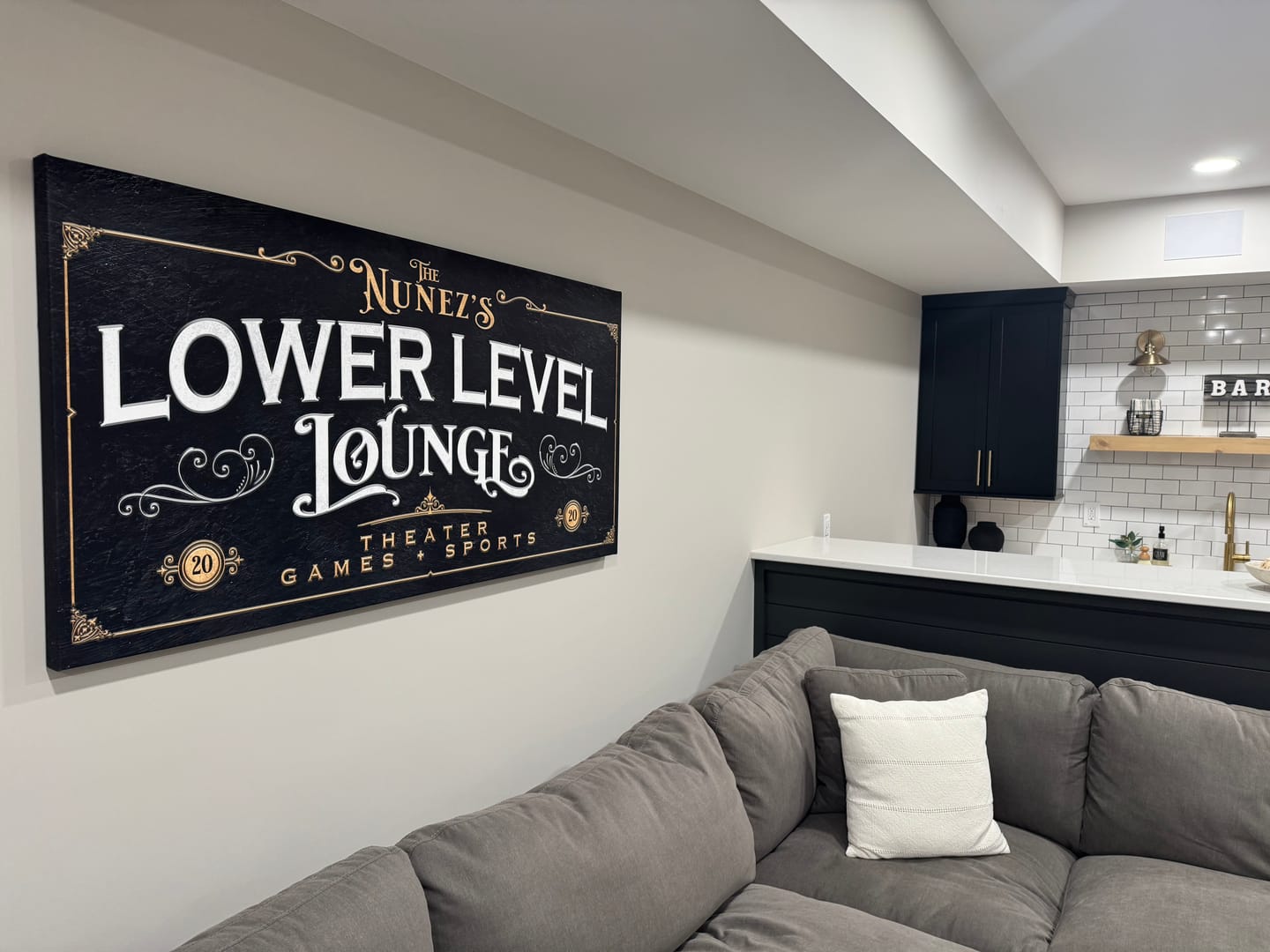 Customer photo review of Personalized Lower Level Basement Bar Sign