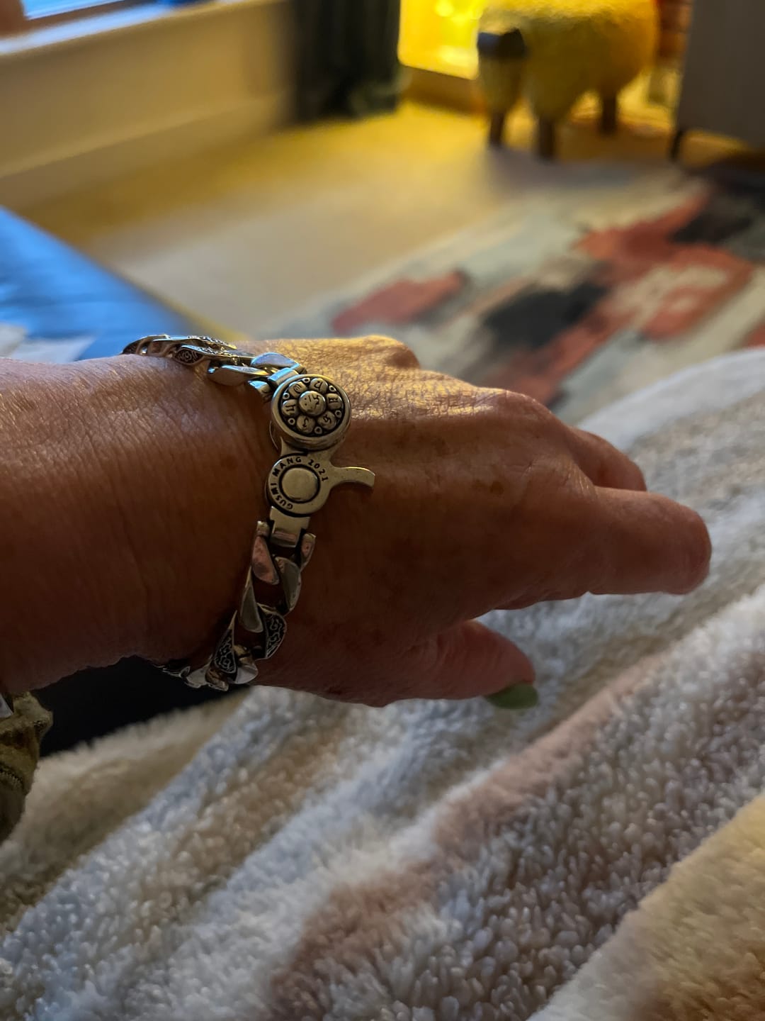 Customer photo review of Buddha Stones Tibet Om Mani Padme Hum Double Dorje Vajra Creativity Bracelet