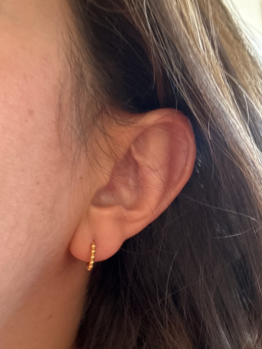 Customer photo review of Ball Hoop Huggie Earrings
