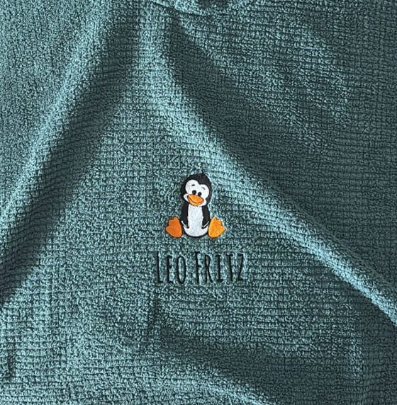 Customer photo review of BIO Badeponcho DELUXE mit Namen bestickt piniengrün
