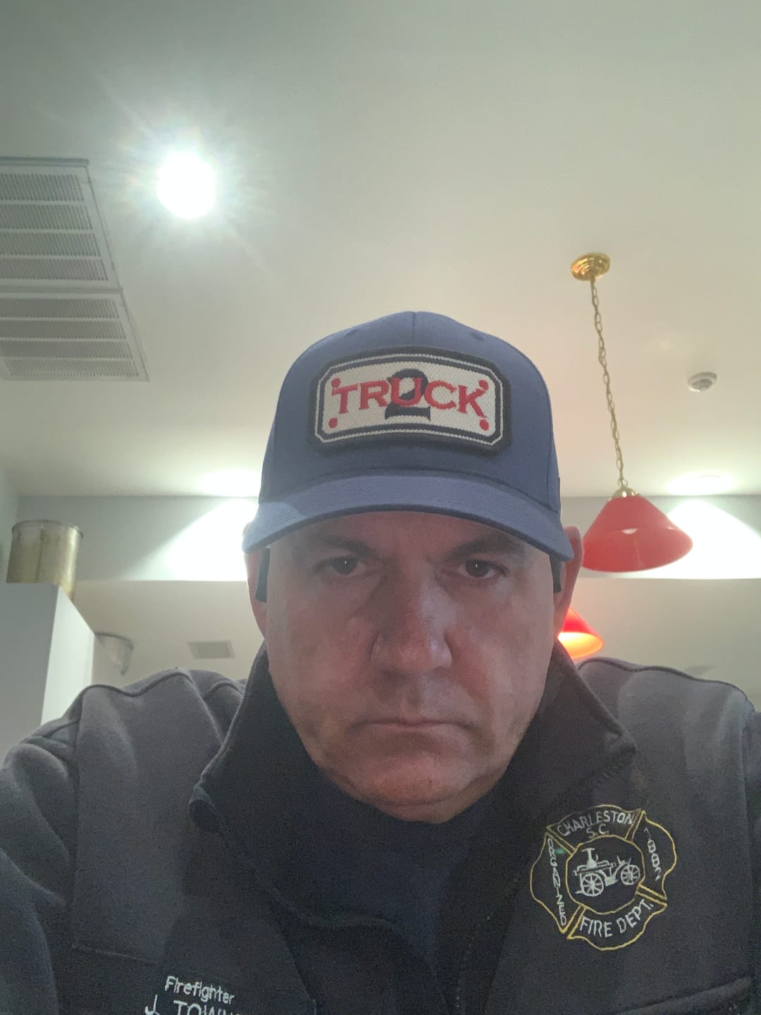 Customer photo review of FLEXFIT HOSE HAT WITH CUSTOM BACK OF HAT