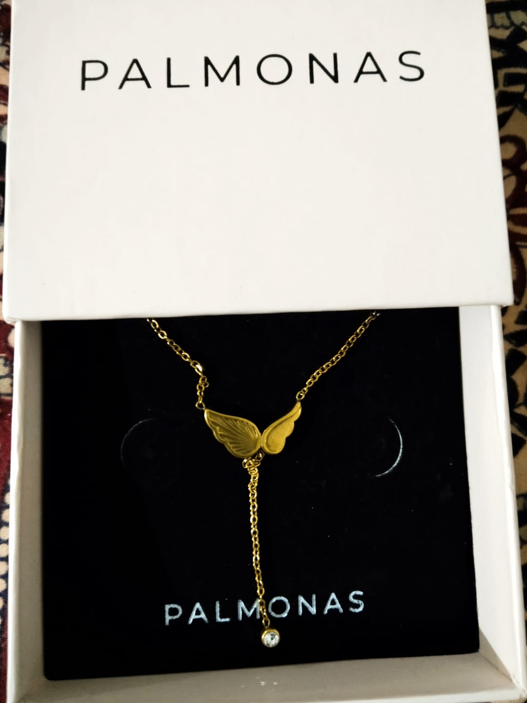 Customer photo review of Angel Wing Dangling Diamond Necklace