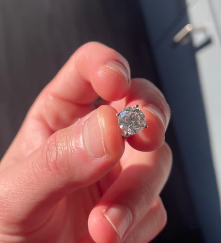 Customer photo review of VVS Moissanite Solitaire Stud Earrings