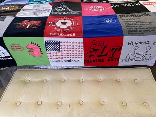 T-shirt quilt with sports, theatre themes by Martha from NM