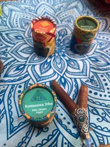 Customer photo review of Handmade Shipibo Palo Santo Wood Kuripe with Crystal Point