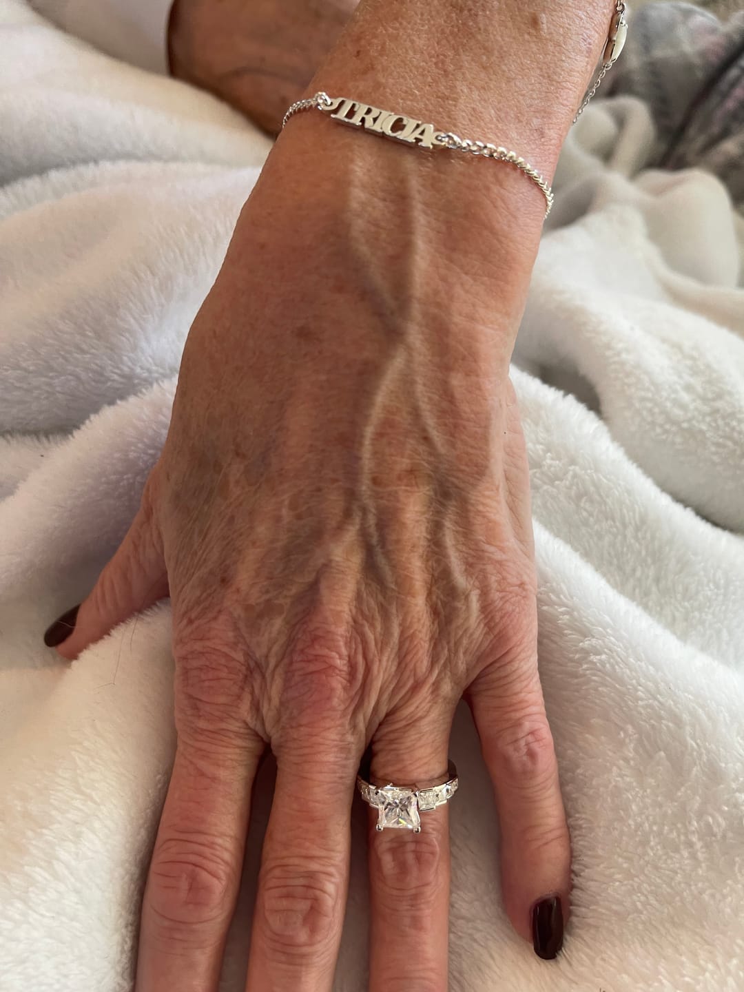 Customer photo review of Princess Cut Moissanite Staircase Channel Set Engagement Ring