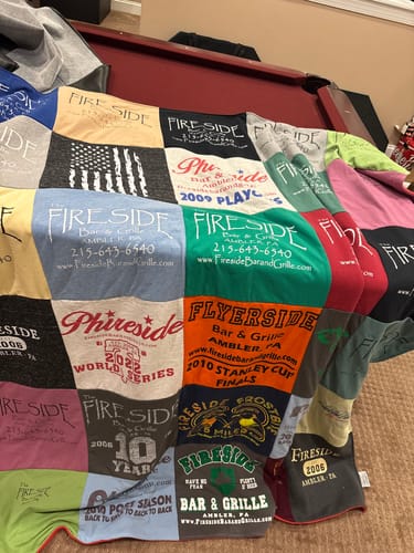 T-shirt quilt with sports, barbecue themes by Jennifer from PA
