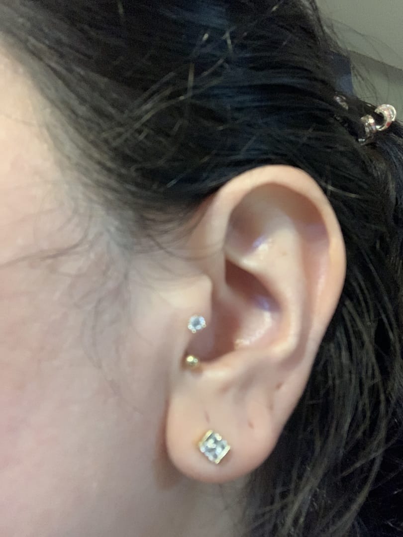 Customer photo review of 14K Gold Ball Round Cubic Curve Piercing 20G