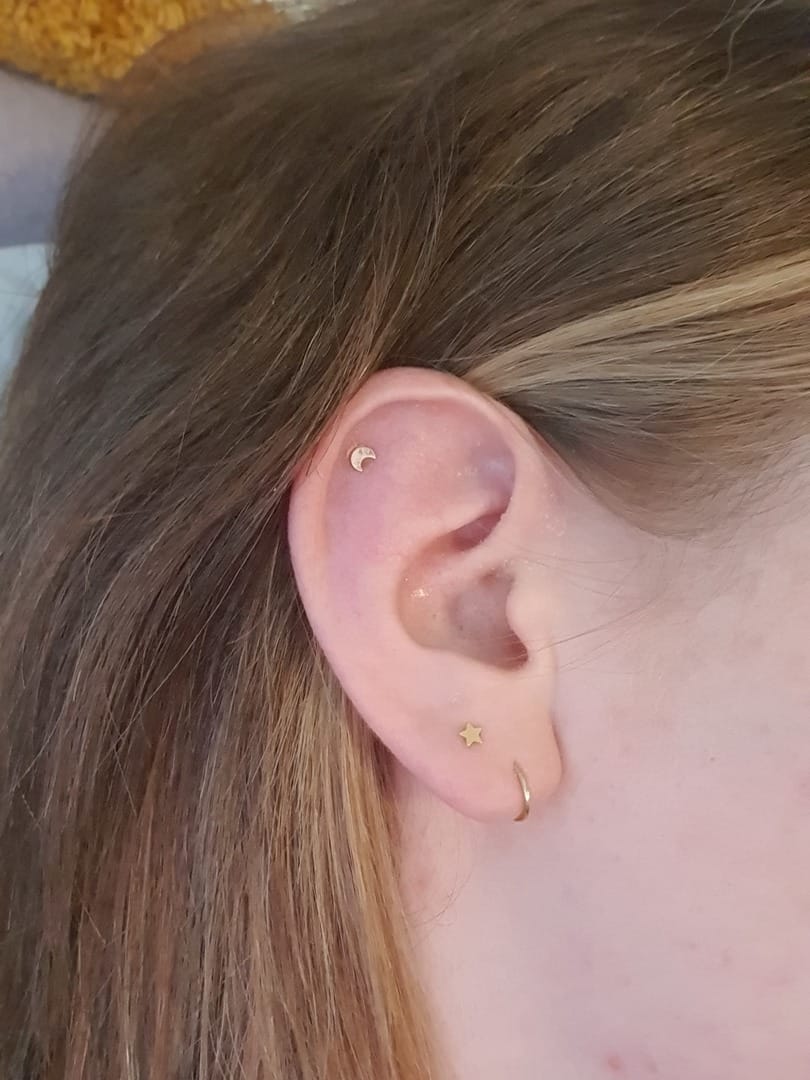 Customer photo review of 14K Gold Moon&Star&Clover Internally Threaded Labret Piercing 18G16G