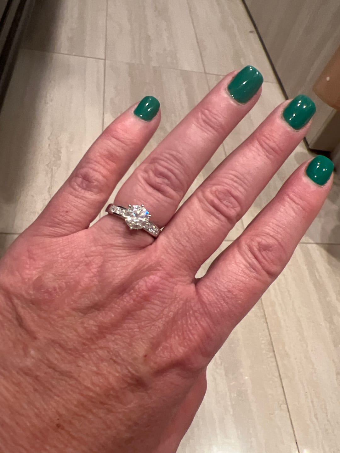 Customer photo review of Round Cut Moissanite Channel Set Engagement Ring