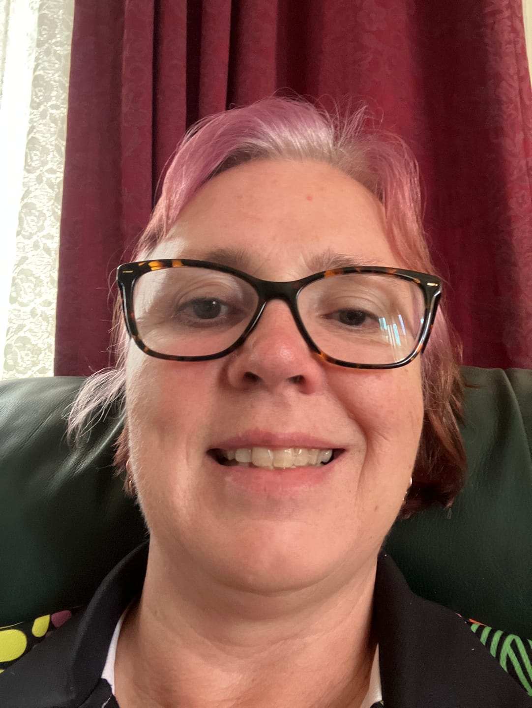 Customer photo review of North Star Heart Huggie Hoop Earrings