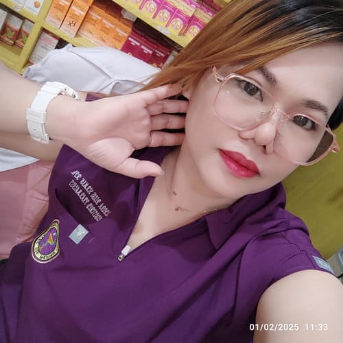 Customer photo review of Zip Up Polo MoveTech® Scrub Top - Women / Plum