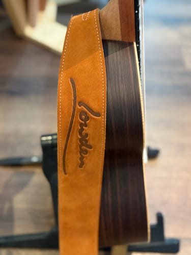 Customer photo review of Honey Suede Guitar Strap