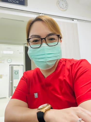 Customer photo review of 5-Pocket MoveTech® Scrub Top - Women / Cherry Pop