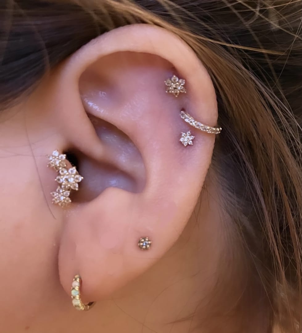 Customer photo review of 14K Gold Lovely Flower Internally Threaded Labret Piercing 18g16g