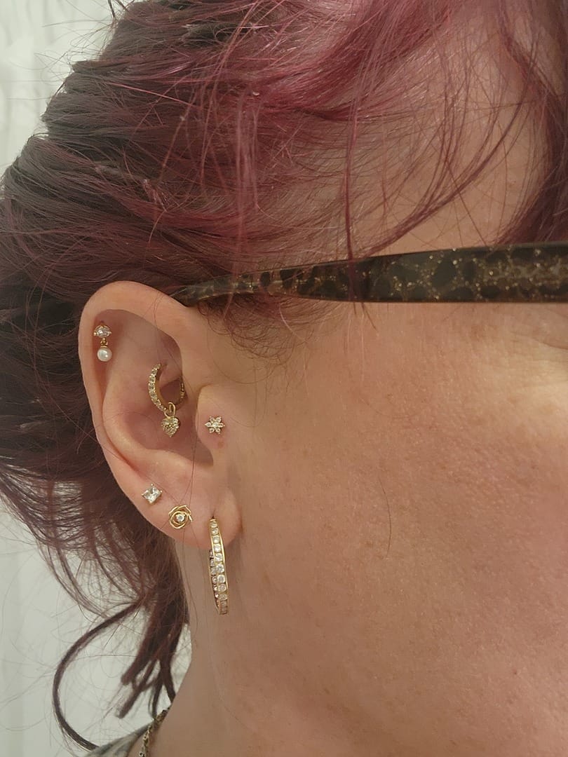 Customer photo review of 14K Gold Mini Cubic Rose Internally Threaded Labret Piercing 18G16G