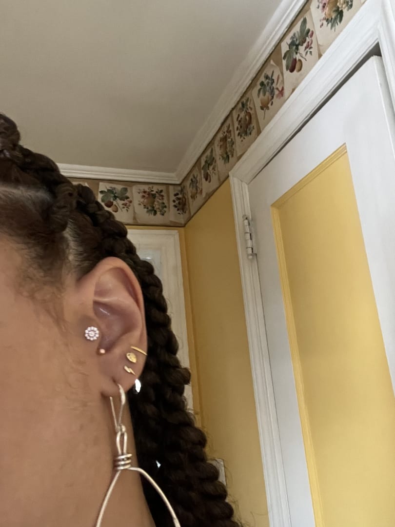 Customer photo review of 14K Gold Cubic Flower U Shape Tragus Earring 20G