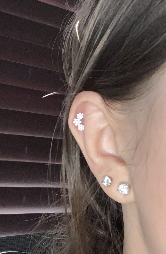 Customer photo review of 14K Gold Triple Flower Cartilage Earring Small 18G16G