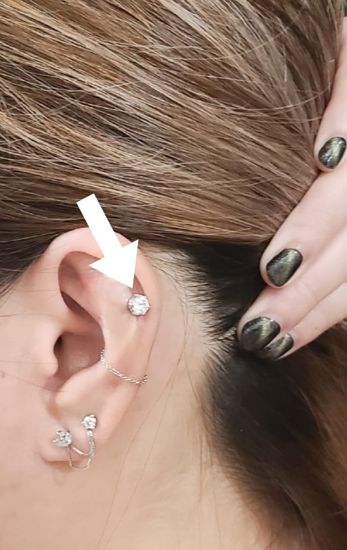 Customer photo review of 14K Gold Moissanite 6 Pronged Cartilage Earring 20G18G16G