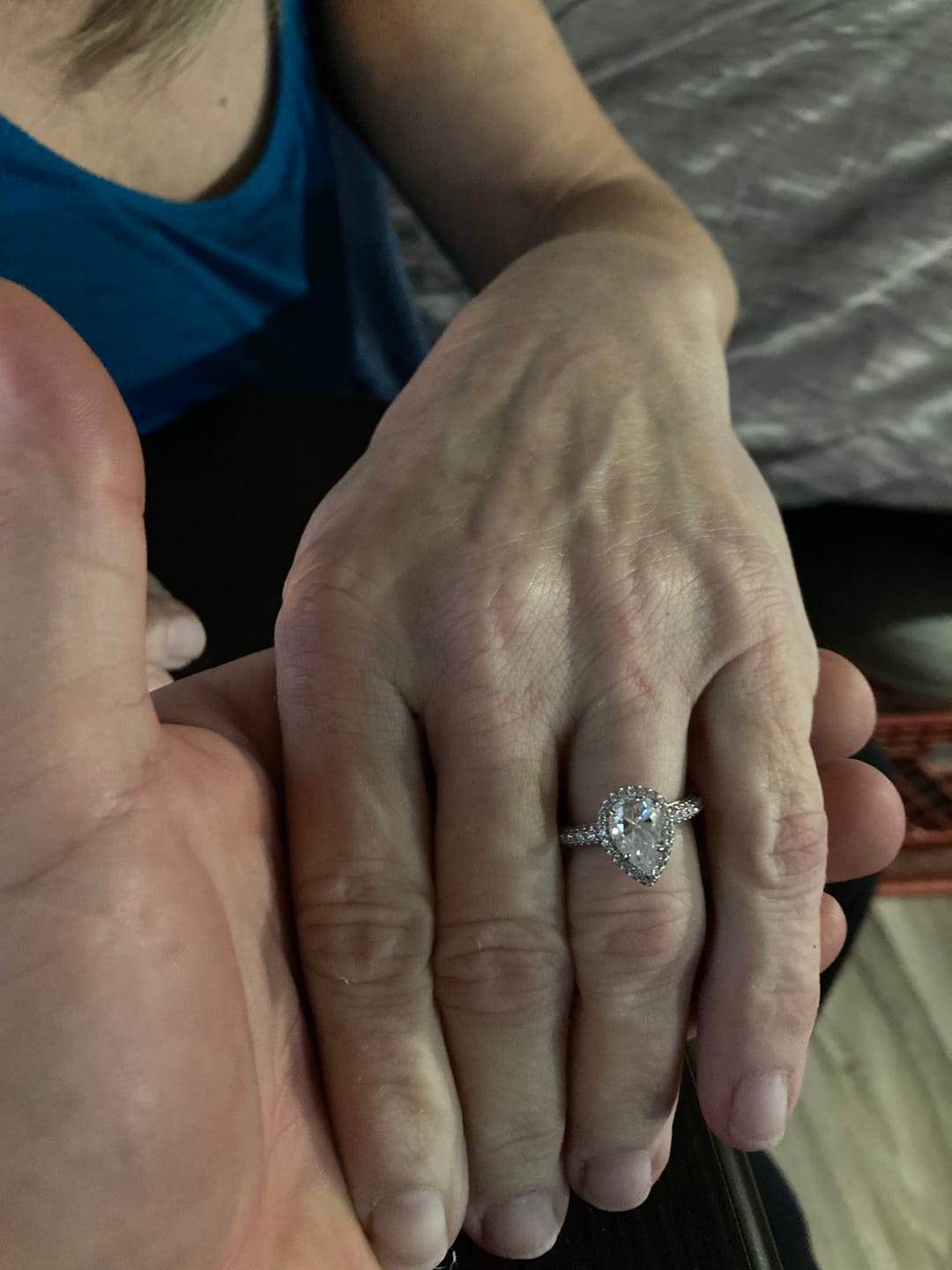 Customer photo review of Halo Pear Moissanite Triple Row Pave Engagement Ring