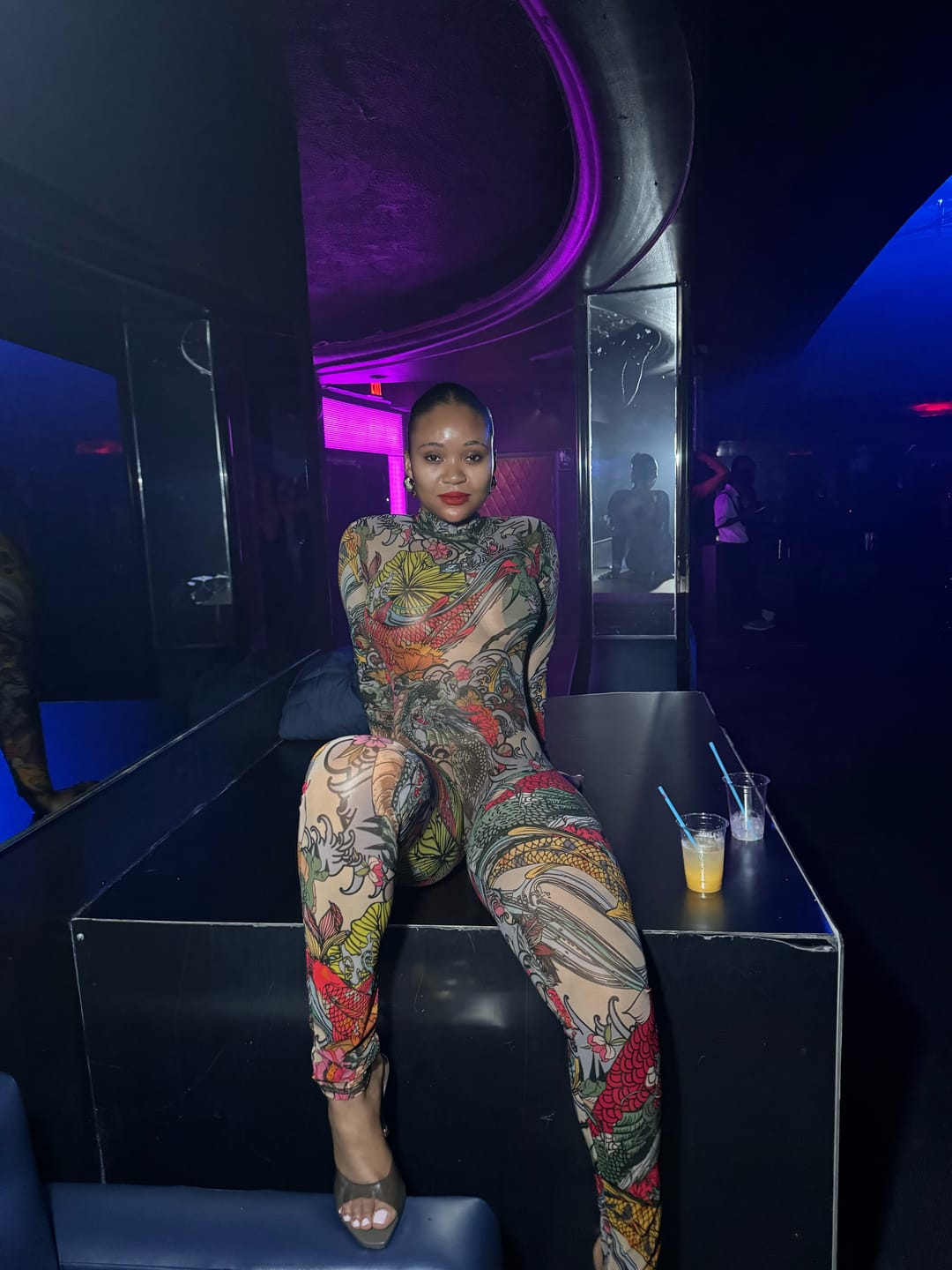 Customer photo review of Coi Long Sleeve Jumpsuit