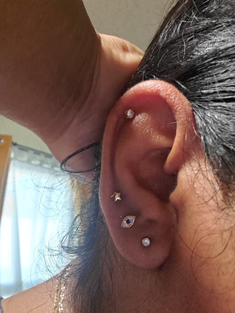 Customer photo review of 14K Gold Piercing Evil Eye Cartilage Earring 20G